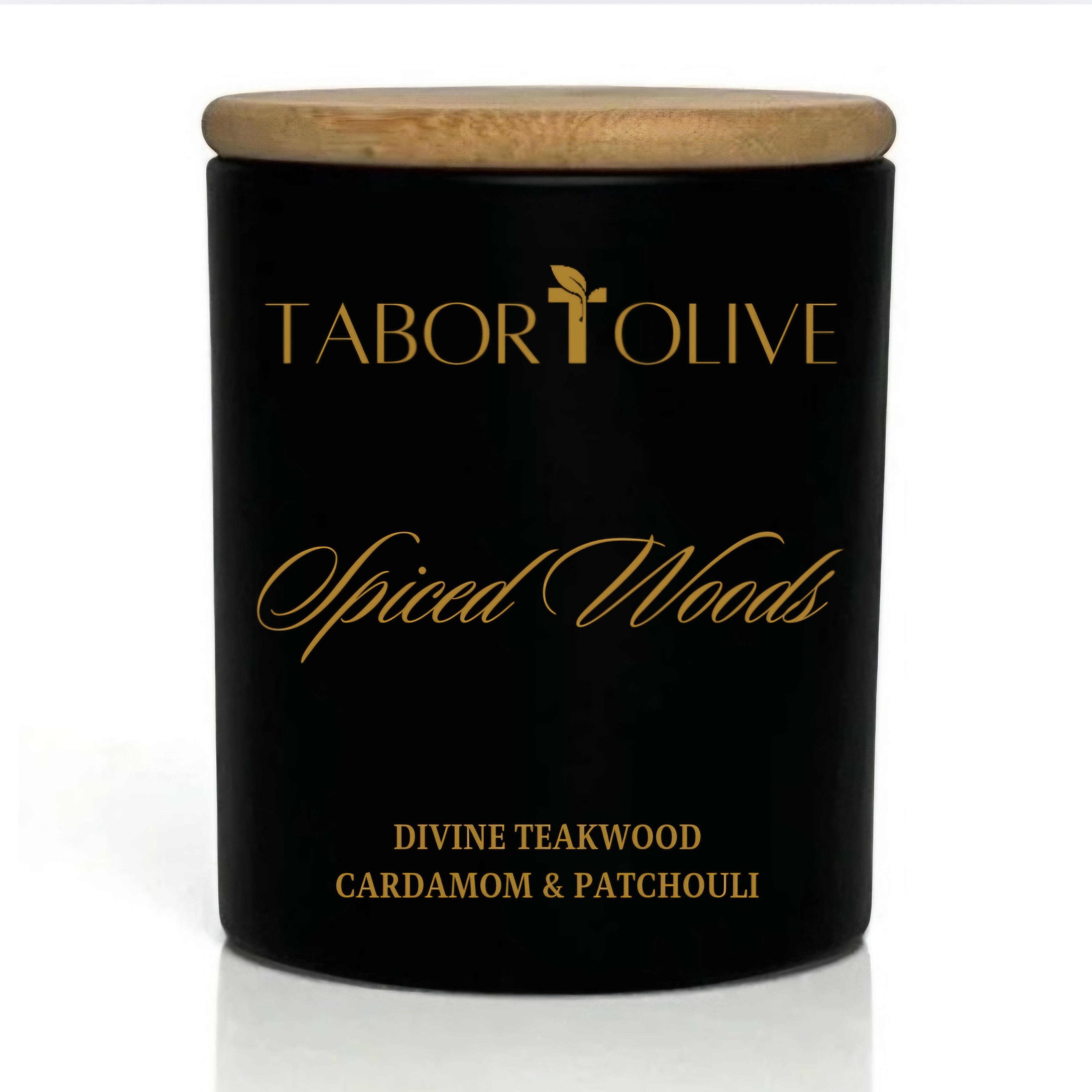 Black candle jar with wood lid and gold text that says, "Spiced Woods. Divine Teakwood Cardamom & Patchouli"